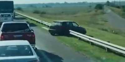 SLPT: Stuck in traffic? Just remove part of the guard rail and be on your way.