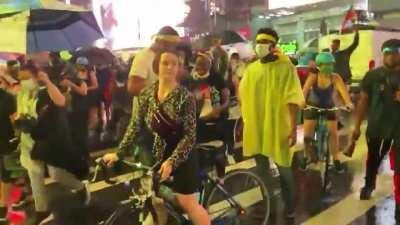 Another angle of vehicle in times square driving through protestors.