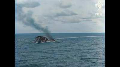 The HMS Barham suffers an ammunition explosion after being torpedoed