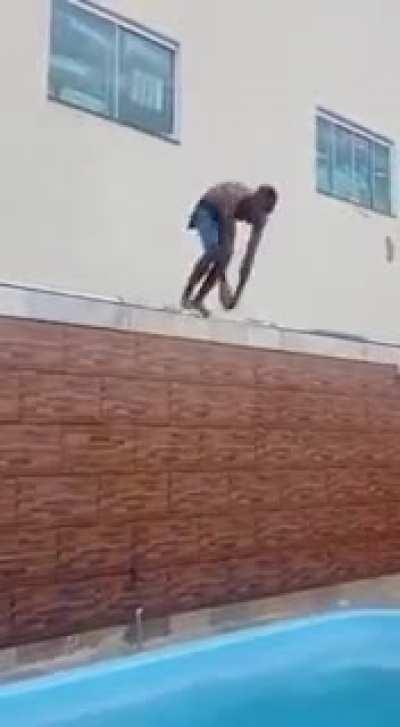 doing a flip into the pool