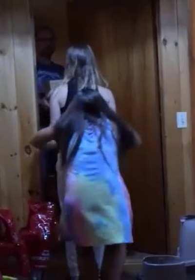 In front of delivery guy