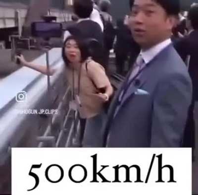 Observers of a new 500 kilometers per hour (311mph) bullet train in Japan have a delayed-mind-blown freakout at it’s speed. 