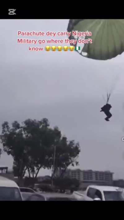 Nigerian Paratroopers training does not go exactly to plan.. public freaks when it unexpectedly starts “raining men”