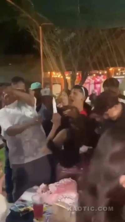 Guy gets poked in the face after shoving birthday girl’s face in her cake