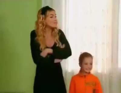 Keep your eye on the girl with the arm cast