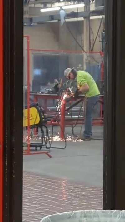 A welding classmate tries to remove a spring from a truck strut using a cutting torch. The laws of physics take it from there.