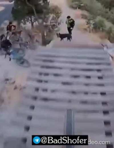 Standing in the middle of a mountain bike trail looking at your phone