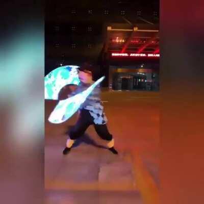 Holograms projection and Kimetsu no Yaiba cosplay