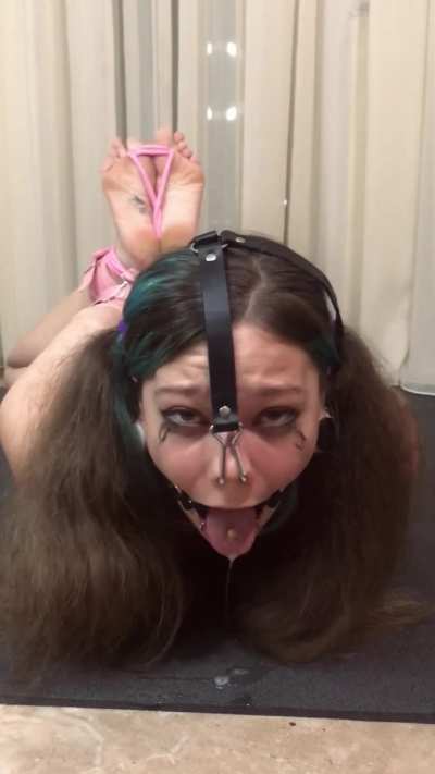 I am hogtied with a nose hook to learn to be obedient.