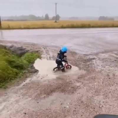 Kid tries to cross puddle and discovers futility of life
