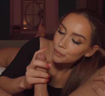 Her fast strokes and eye contact make him cum