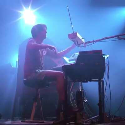 Mezerg playing a theremin