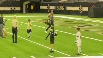 Brees and Brady hug it out after Brady beets Brees in playoffs. Brady throws a touchdown pass to Brees' son. Brady walks off to the NFC championship and Brees stays to play with his family. Sportsmanship done right.