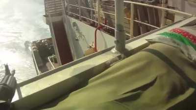 Somewhere off the coast of Somalia on the Indian Ocean, a Vessels private Security defends the vessel from an attempted boarding attack. (2012)