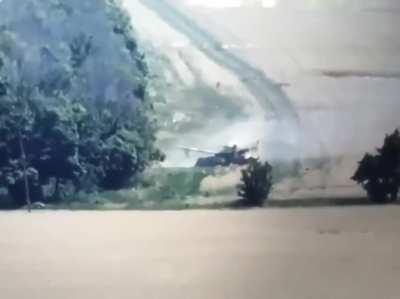 Footage of a Russian tank being hit twice by Ukrainian ATGMs, east Ukraine