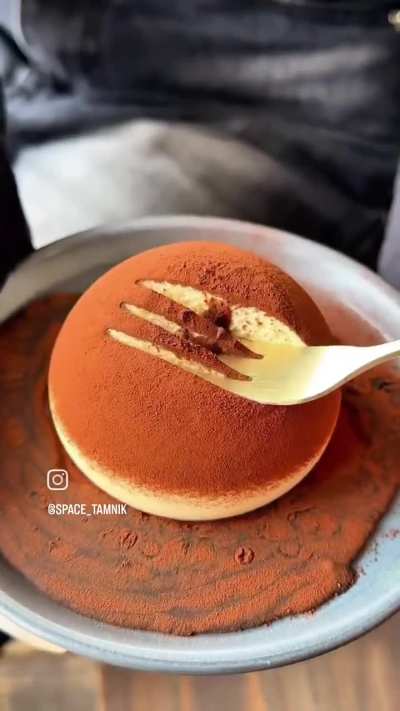 Pouring Chocolate over a Tiramisu