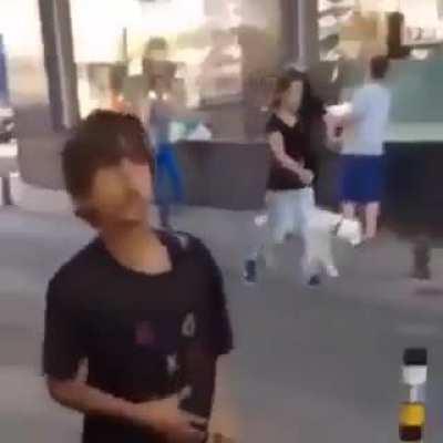 Kids in the street insulting the Adults context: Kid with black shirt 