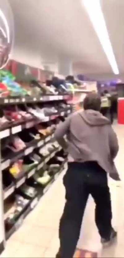 Man tries to save his son from the police, with WWE commentary added.