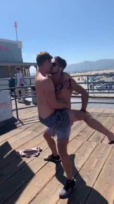 A couple of Proud Boys confront protesters at the beach