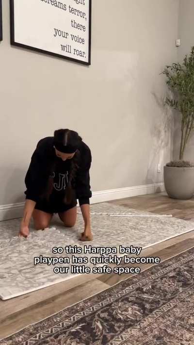 Weird Ad with Harppa Baby with Brittany setting up Baby M's Playpen in the Living Room.