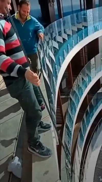 The precision needed to install a glass railing on every floor