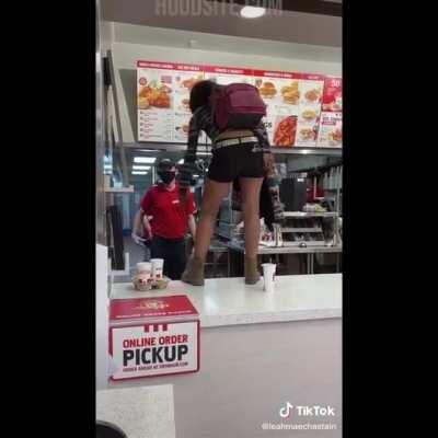 Angry woman unsuccessfully demands some chicken at KFC in Fresno.
