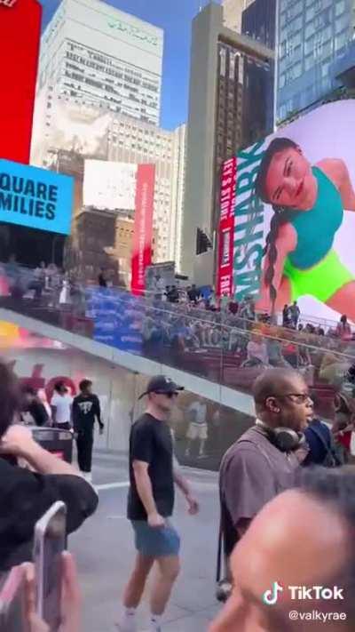 Her reaction to seeing the billboard