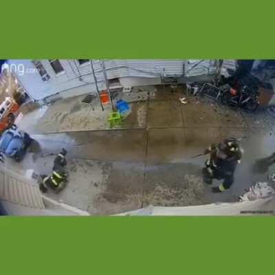 Firefighter gets hit with falling AC Unit