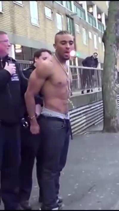 Guy pisses himself after getting arrested