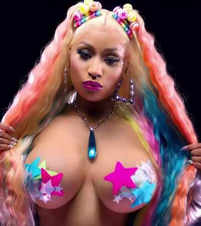 Nicki Minaj teasing her boobs