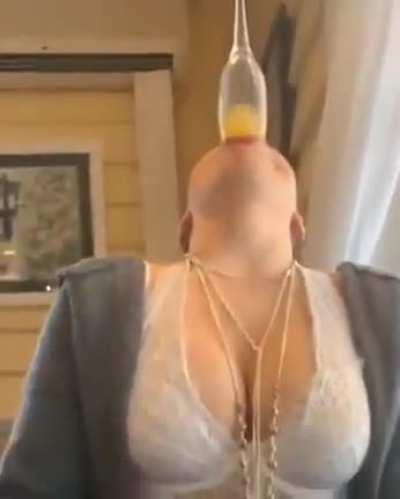 To gulp down a drink without using hands