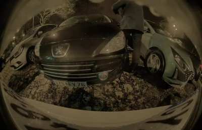 Upset guy because of non electric parked car on a charging spot