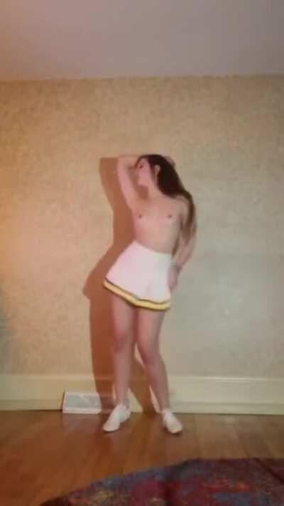 Babe Strips Out Of Her Cheer Uniform