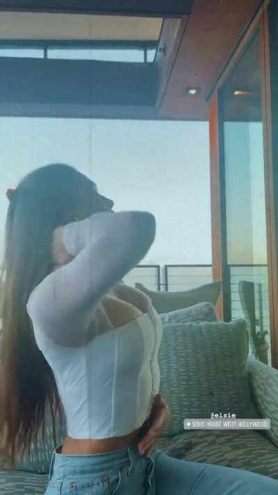 playing with her hair