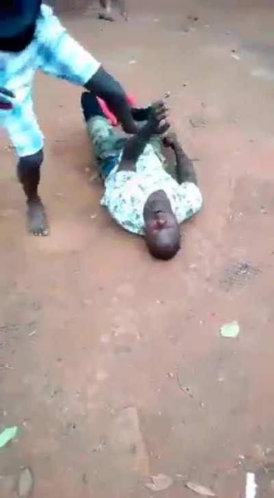 Village fight from Uganda, one fella kept pressuring the other to fight , gets K.O'd.