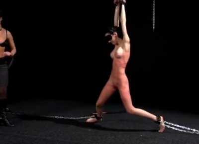 Turning away in a futile attempt to escape the pain