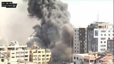 Israeli army airstrike destroys the Al-Jalaa building in Gaza, used as the offices of AP and Al-Jazeera.