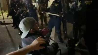 BLM little-person barks orders at riot police