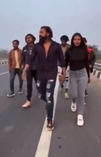 TikTok influencers filming on the highway 