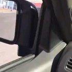 This man carrying a van on top of his car