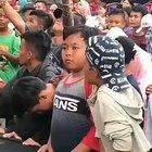 Kid stuck in the front row of a concert