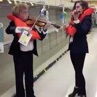 Outstanding. Violinists playing the Titanic bands song as the ship sank, but in the Toilet Paper aisle of the supermarket. Wearing life jackets and all.