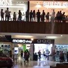 Mall is flooding and the band plays an appropriate song