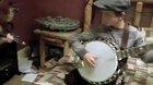Kid plays banjo like a champ
