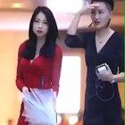 Long cool woman in a black dress