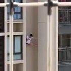 Why not climb this tall building and get stuck