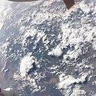 What is this object flying between astronaut and earth?