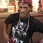 [NSFW] Man showcasing hits nuts in a public street