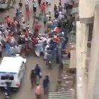 Rapid action force is being chased away by *youknowwho* in Howrah, West Bengal. In audio, kids are shouting 