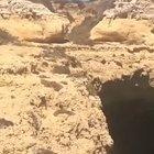 Guy jumps off cliff into tour boat.